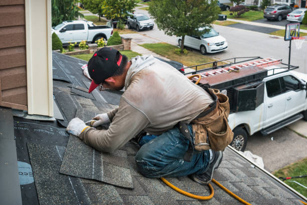 Professional Gutter Repair And Installation technician working in Fuquay-Varina, NC